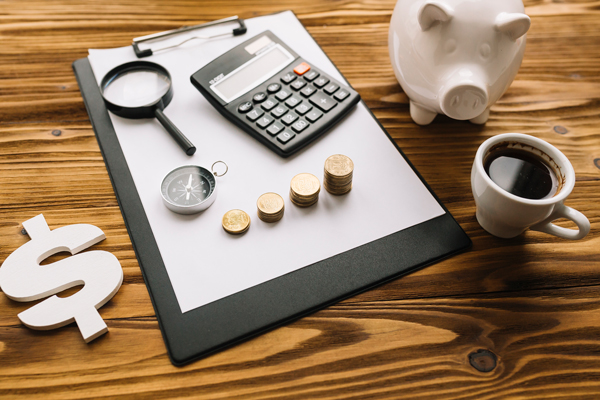 desk with money items